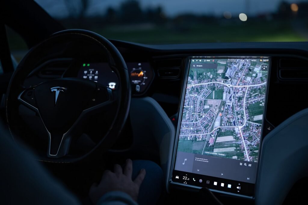 Car buyers demand lower prices and better tech, Bain says