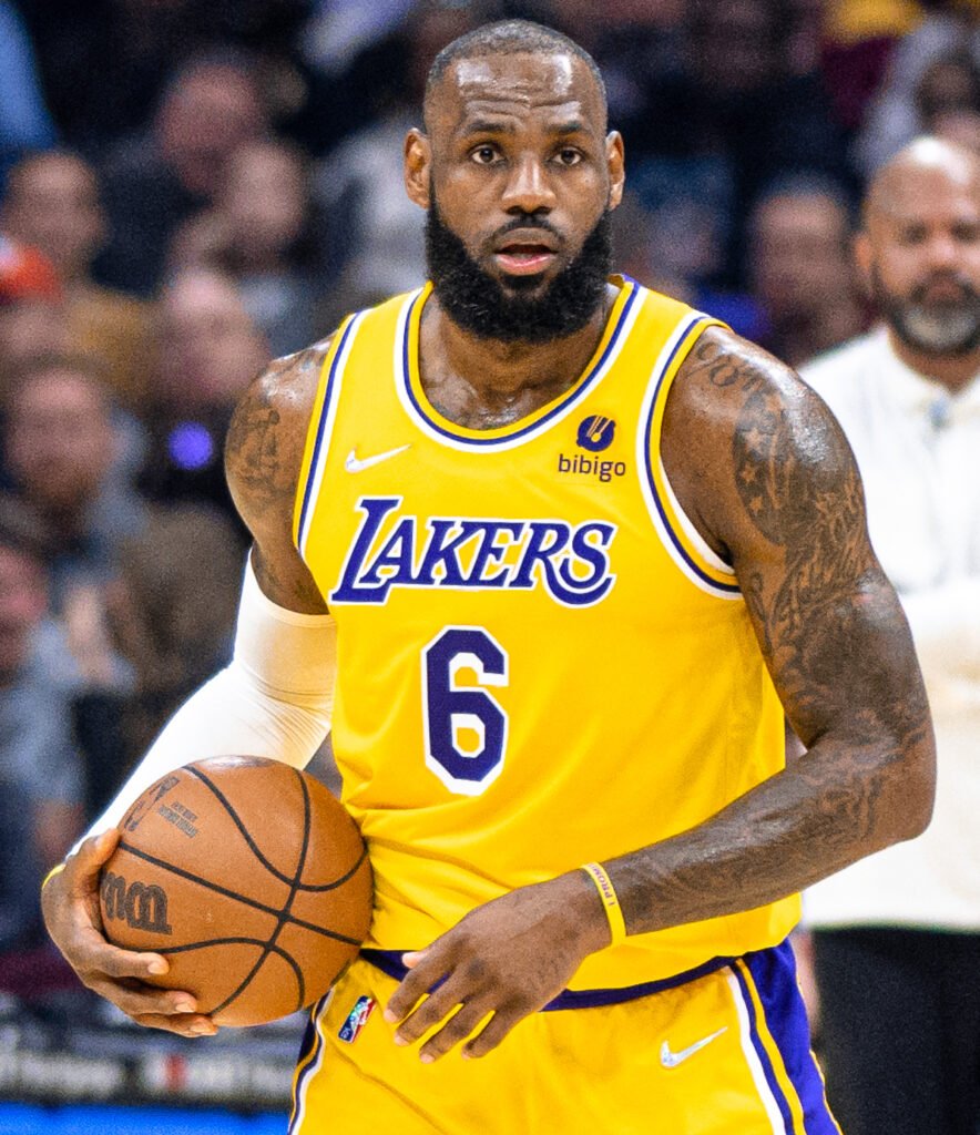 LeBron James plays center, helps limit Karl-Anthony Towns in Sixers debut
